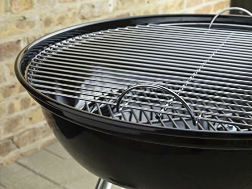 Closeup of a charcoal grill on a patio