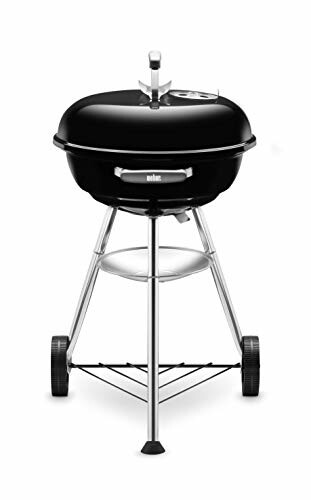 Black charcoal grill with wheels and stand